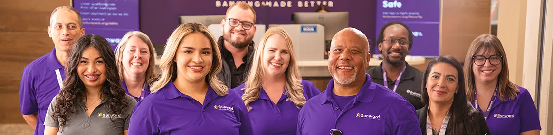Sunward employees standing together and smiling