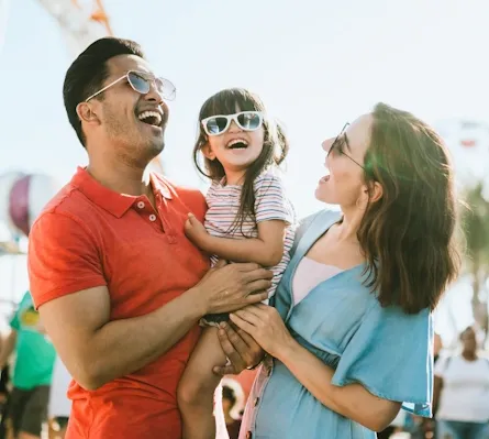 A family of three at a fair