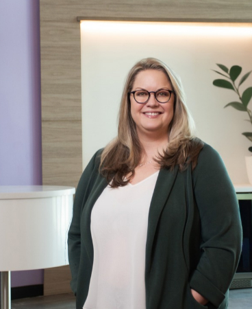 Ann Baur, Senior Vice President of Retail Experience at Sunward Federal Credit Union, poses in the credit union’s Ladera branch.