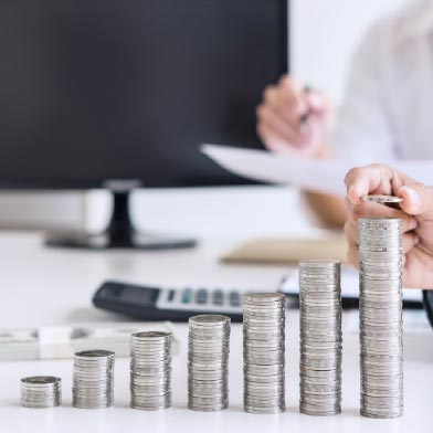 Close up of stacks of coins on table