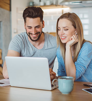 Couple using computer together