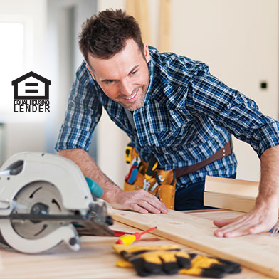 Man using table saw for home renovations