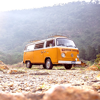 Classic van in dusty southwest mountains